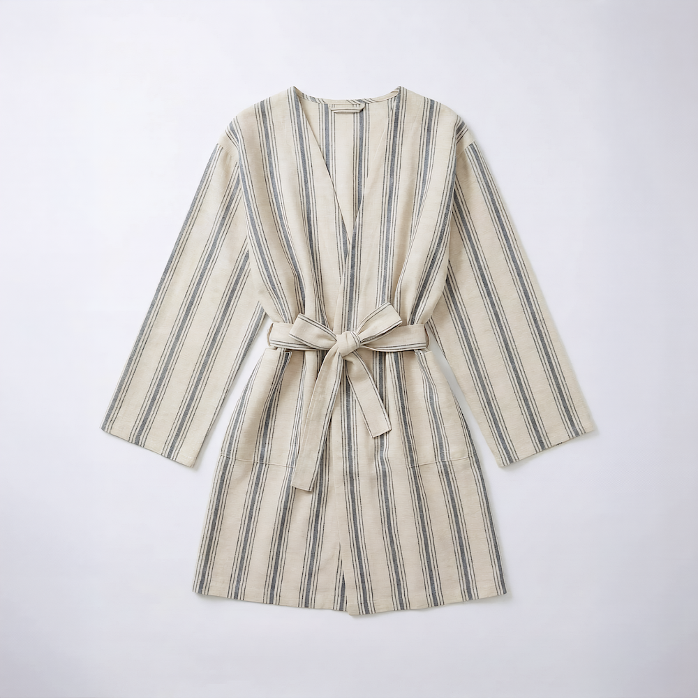Blue striped atelier orea robe with a belt on a white background
