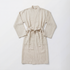 Beige striped atelier orea robe on a white background