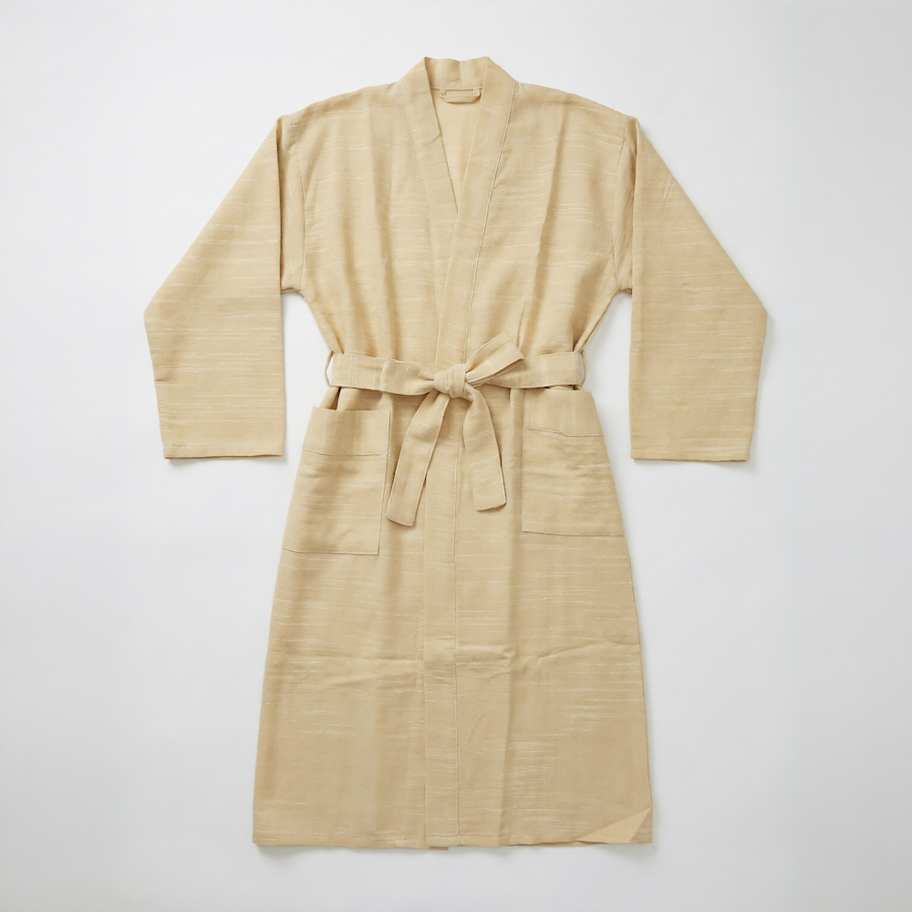 yellow handwoven atelier orea robe on a white background