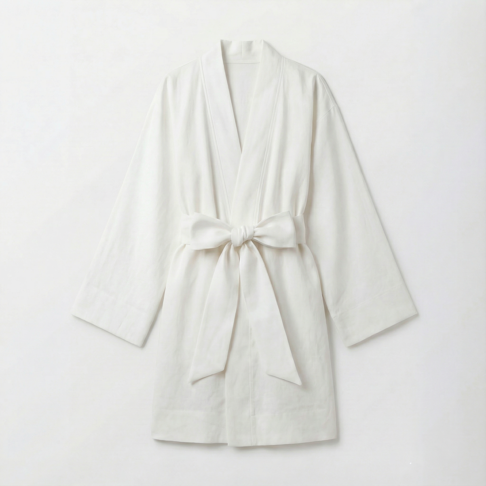 White atelier orea kimono robe with a tie waist on a white background