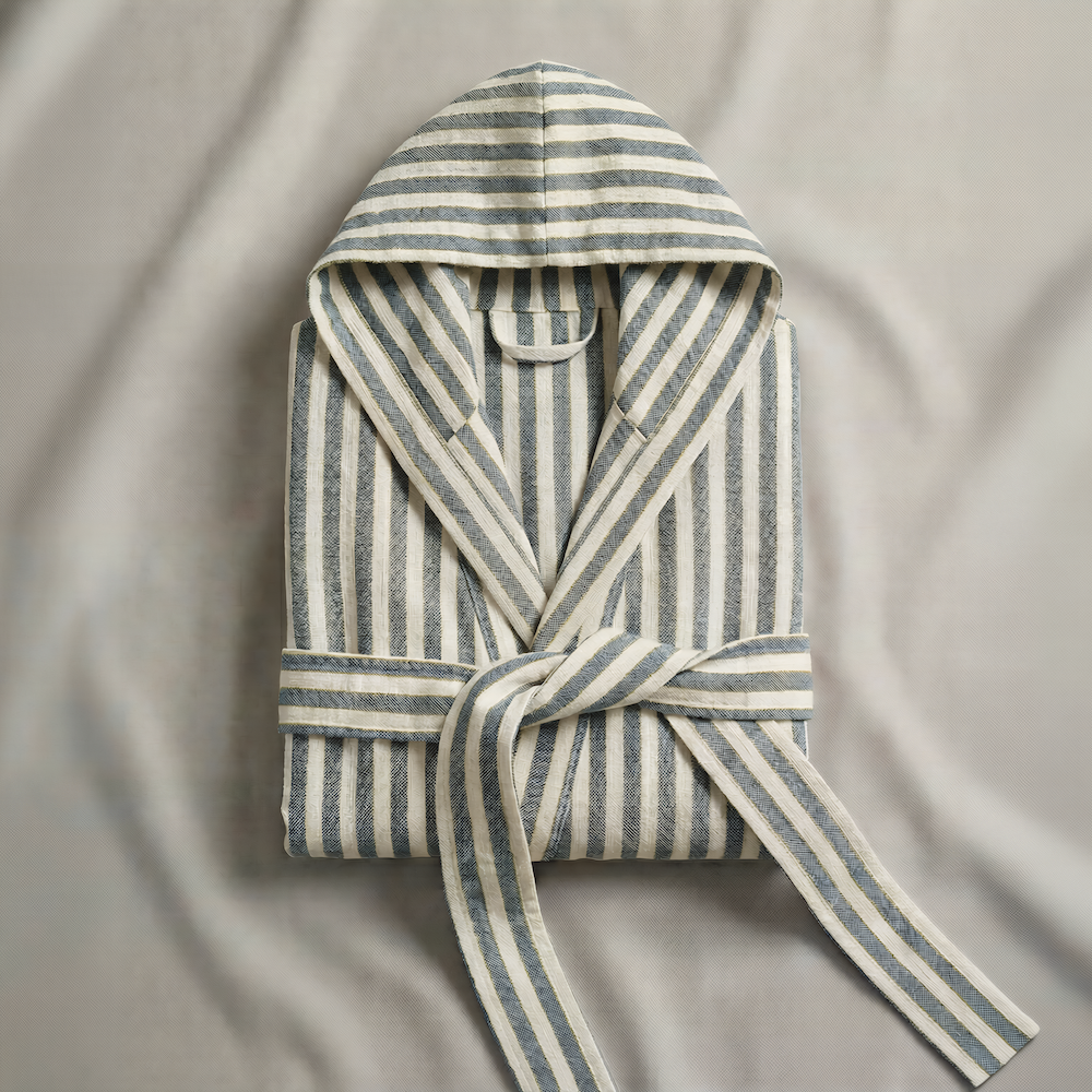 Gray Striped hooded atelier orea robe on a soft gray background